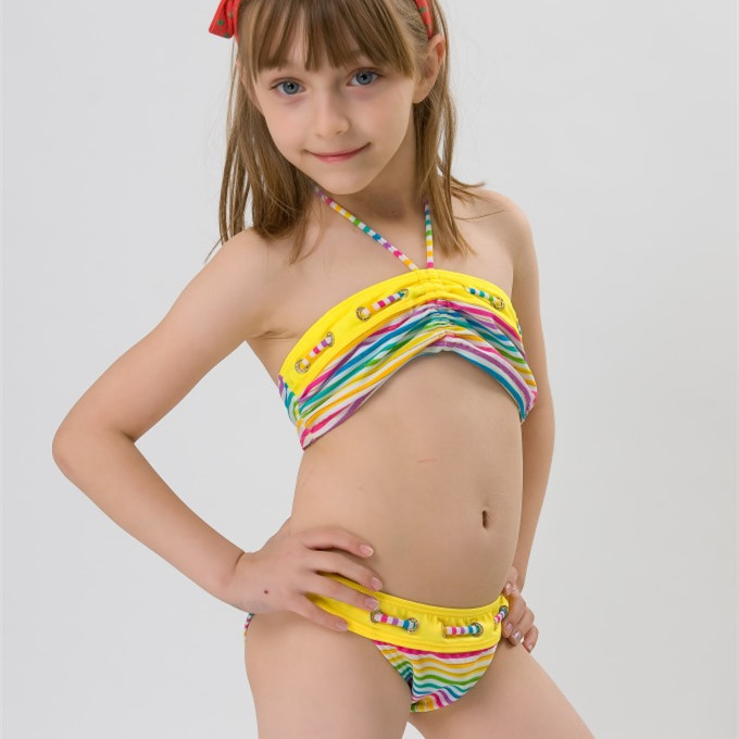 Photos: Do these bikinis sexualize children? Gwyneth Paltrow has been accused of sexualising young girls after promoting bikini range for kids.