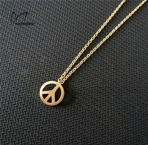 gold peace sign