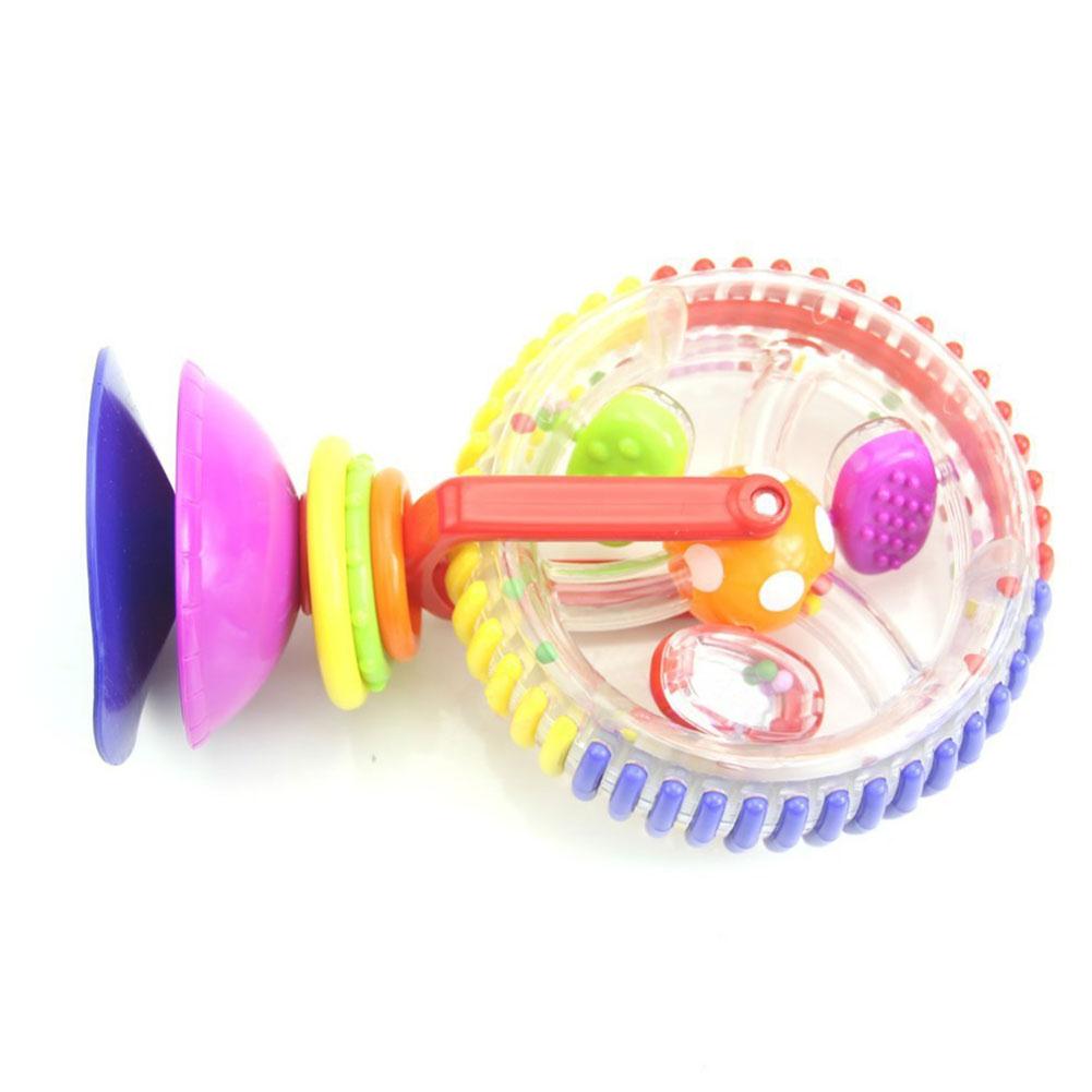 sassy developmental wonder wheel suction toy