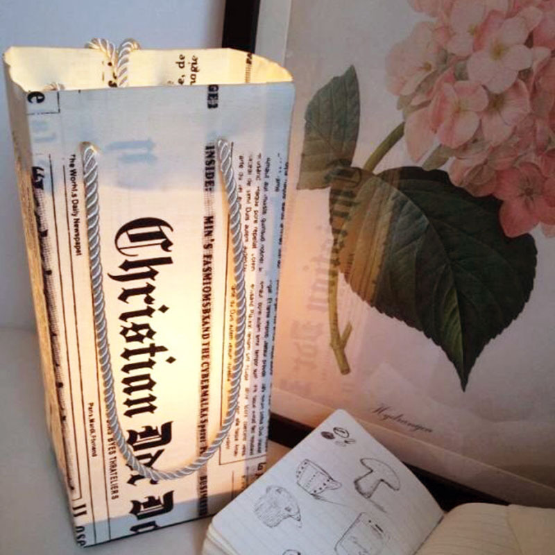 220v-11001-Creative-fashion-Newspaper-Bag-lamp-bedside-lamp-nightlights-12x12x27cm.jpg