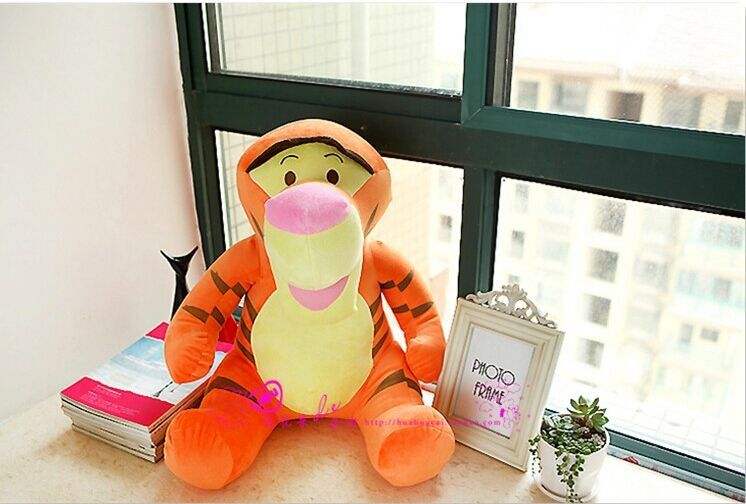 Фотография middle size lovely stuffed tiger toy new stuffed jumping tiger toy  doll gift about 60cm