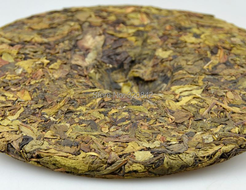raw puer tea 357g tea pu er Source spike tree of golden yellow piece goods Ye