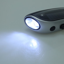 4 Ultra bright LED lights Hand Crank Dynamo Solar Powered Flashlight Emergency Radio