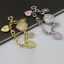 Caliente venta Fashionab corazón pulsera elegante análogo de cuarzo señora de WristWatch mujeres rosa relojes de oro mujeres reloj pulsera