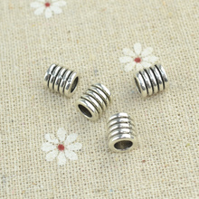 50pcs/lot metal vintage tibetan silver spiral charms diy beads for European bracelets