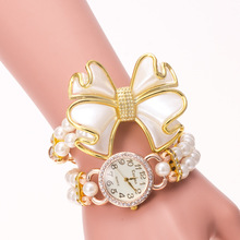 2015 nuevos relojes de lujo perlas alta calidad relojes moda mujeres reloj pulsera capas de liquidación arco reloj de cuarzo