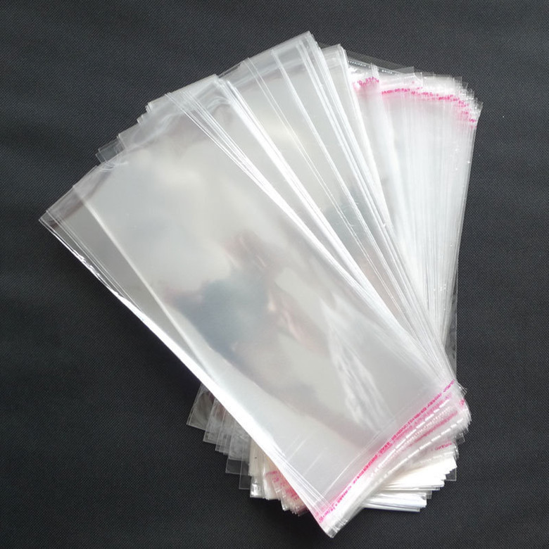 11*27cm Self Adhesive Seal OPP bag clear plastic sock package bag whole sale 100pc/lot on ...
