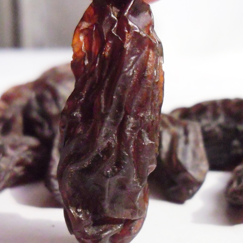 Xinjiang raisins dried fruit Large red raisins with seeds 500g full of natural sweetness drying free