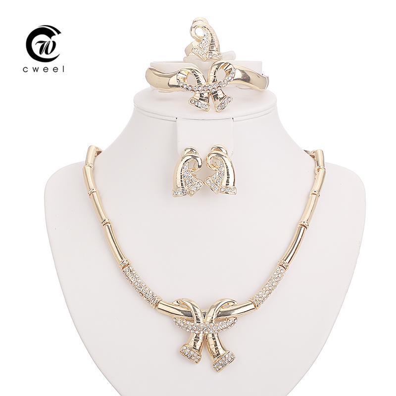 http://g04.a.alicdn.com/kf/HTB1oAaQIVXXXXcEXpXXq6xXFXXXa/Crystal-Necklace-Set-African-Beads-Jewelry-Sets-For-Women-Fine-Earrings-Gold-Plated-Pendant-Wedding-Dress.jpg