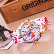 Nueva alta calidad del cuarzo Reloj de pulsera relojes Women chica Reloj de primeras marcas de lujo de silicona flor impresa Causal Reloj envío gratis