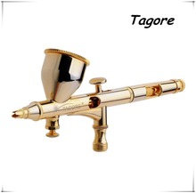 Marca ” Tagore ” TG180G Hot New 24 quilates chapado en oro 0.2 MM 9CC alimentación por gravedad Mini arma de aerosol del aerógrafo pluma porque Tattoo maquillaje pastel