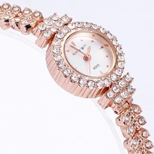 In 2015, the most popular fashion rose gold bracelet rhinestone crystal quartz watch lady watches round women’s fashion watches